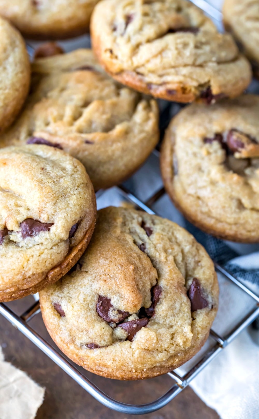 Overhead view of muffin tin chocolate chip cookies on wire rack