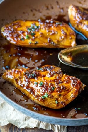 Pieces of Honey Garlic Chicken in a skillet