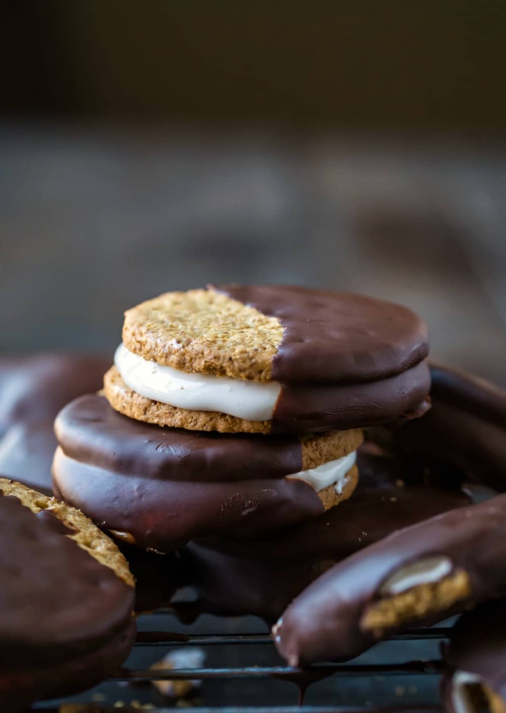 Stack of chocolate dipped s'mores no bake cookies