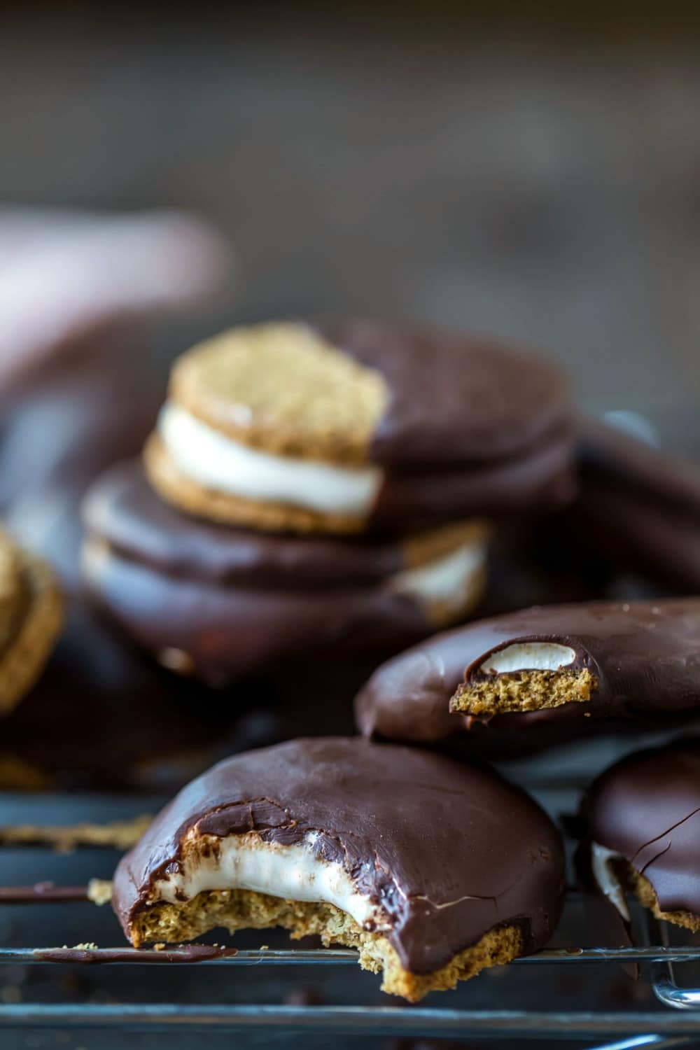 Stack of s'mores no bake cookies on a wire cooling rack