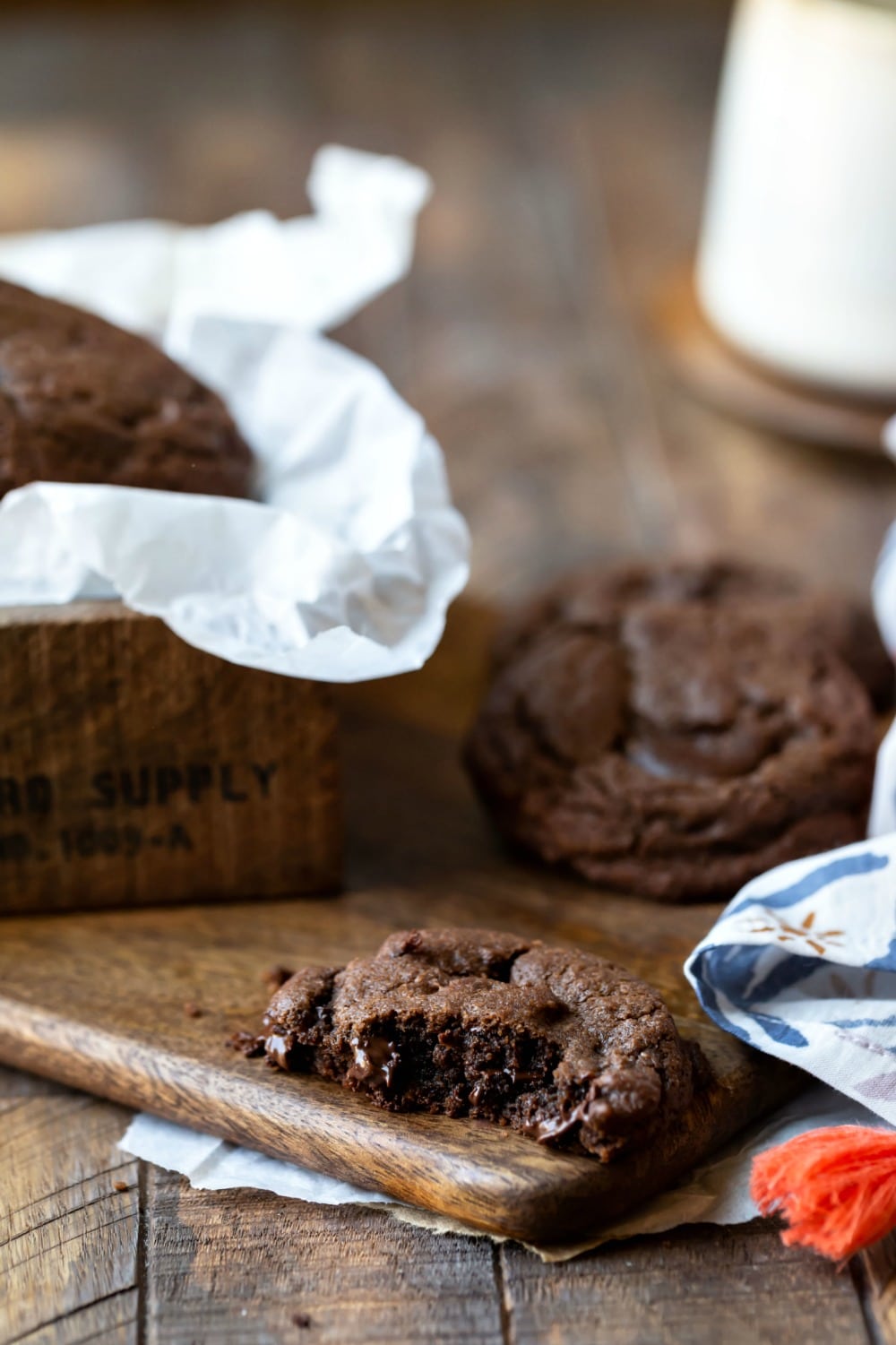 Chocolate Chocolate Chip Cookies next to a print napkin