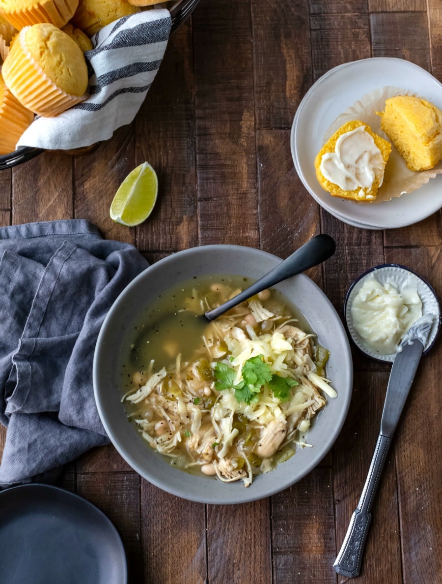 Bowl of White Chicken Chili topped with sour cream and cilantro