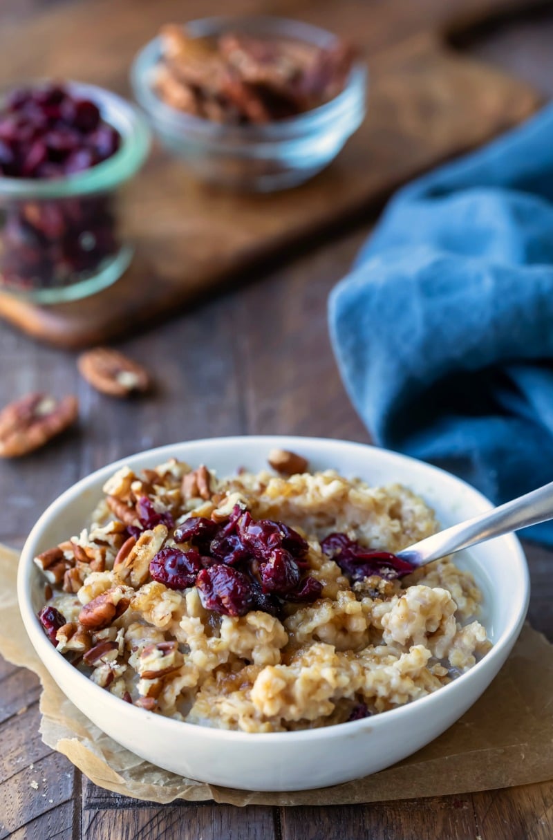 Instant Pot steel cut oats topped with pecans and dried cranberries