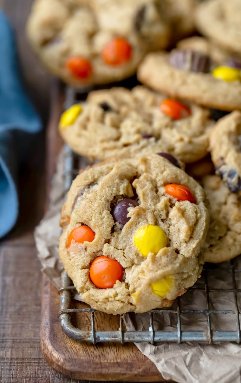 Stack of ultimate peanut butter cookies on a wire cooling rack