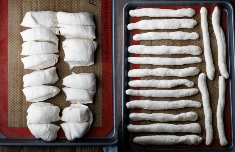 Unbaked garlic breadsticks on a baking tray