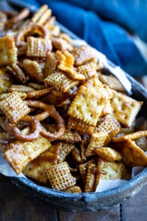 Toffee Chex Mix in a metal dish.