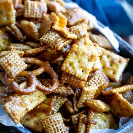 Toffee Chex Mix in a metal dish.