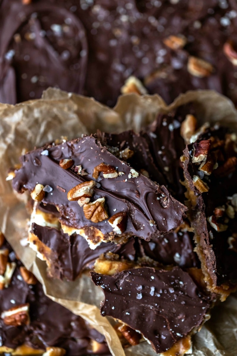 Saltine Toffee Pieces of saltine toffee on brown parchment paper
