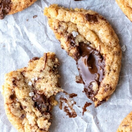 Whole wheat chocolate chip cookie next to a chocolate chunk