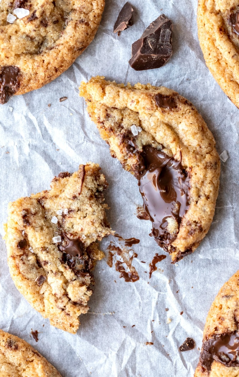 Whole wheat chocolate chip cookie next to a chocolate chunk