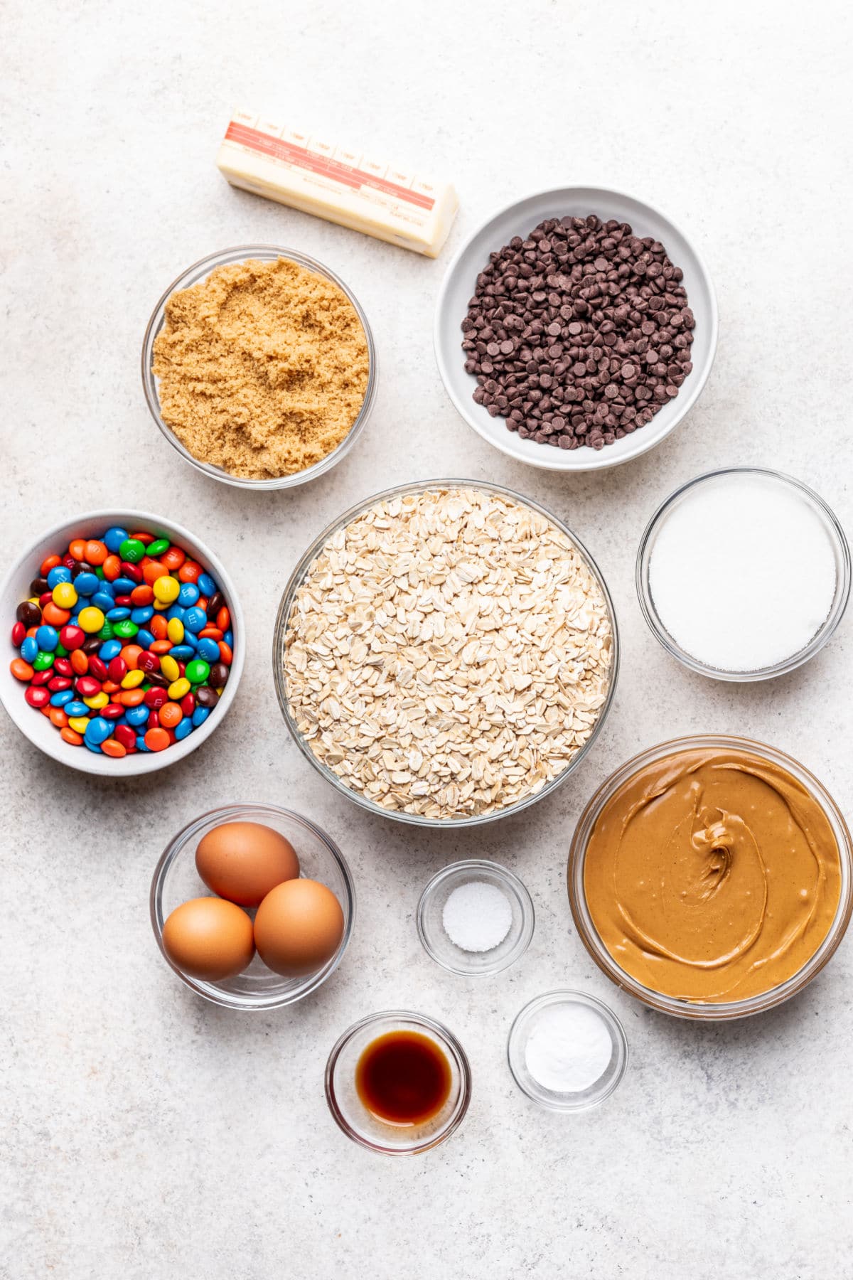 Ingredients for monster cookies in dishes.