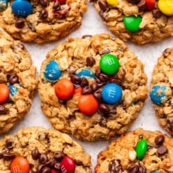 A monster cookie with more monster cookies around it.