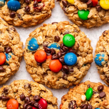 A monster cookie with more monster cookies around it.