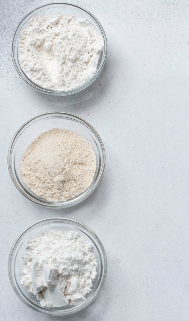 Three glass dishes with flour