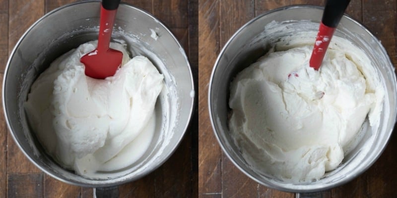 Whipped cream in a silver mixing bowl