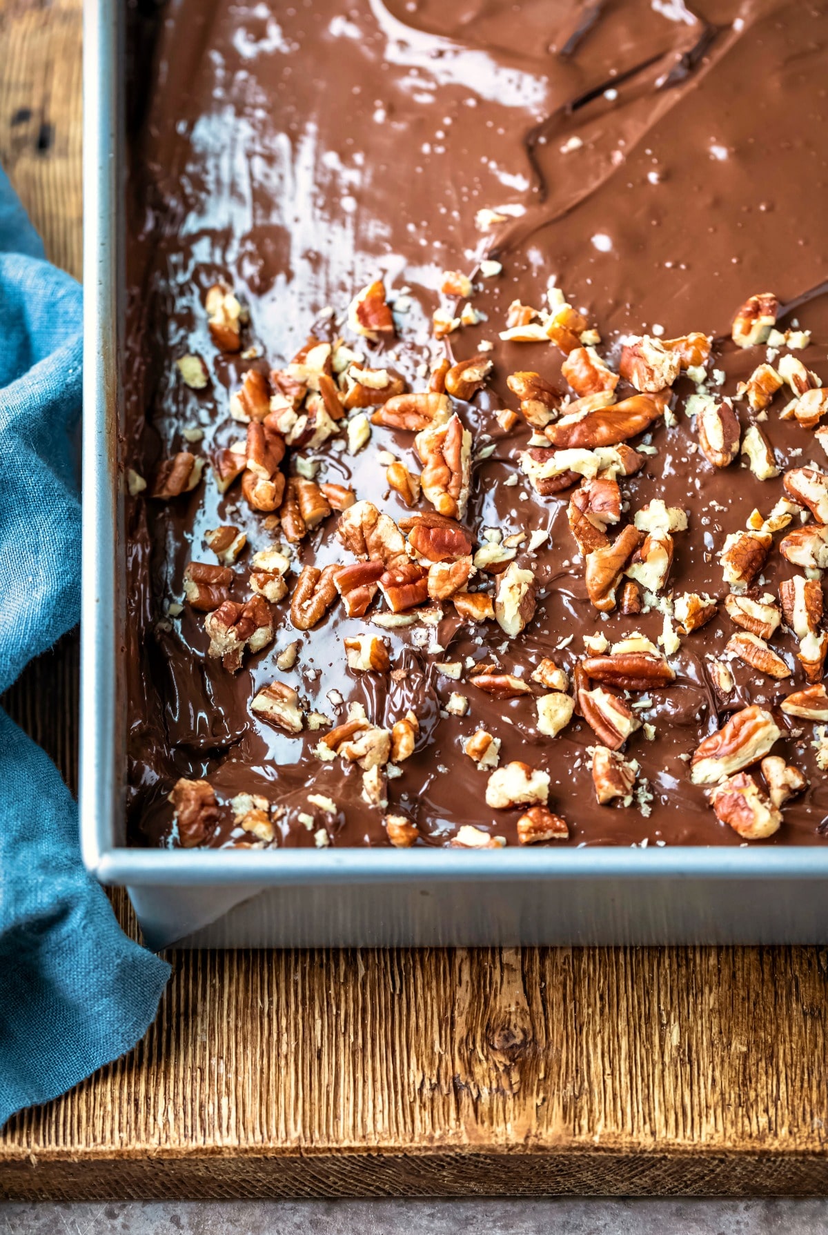 Chocolate Zucchini Cake Chocolate frosted chocolate zucchini cake in a silver baking pan