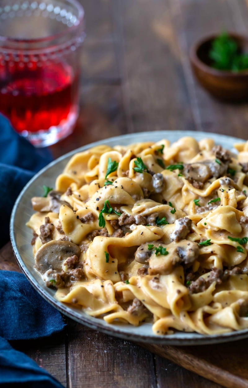 Plate of Instant Pot Beef Stroganoff topped with chopped parsley