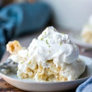 Piece of no bake key lime pie on a white plate