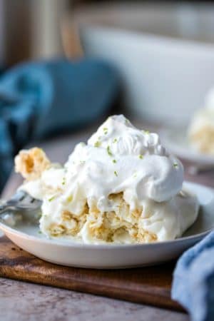 Piece of no bake key lime pie on a white plate