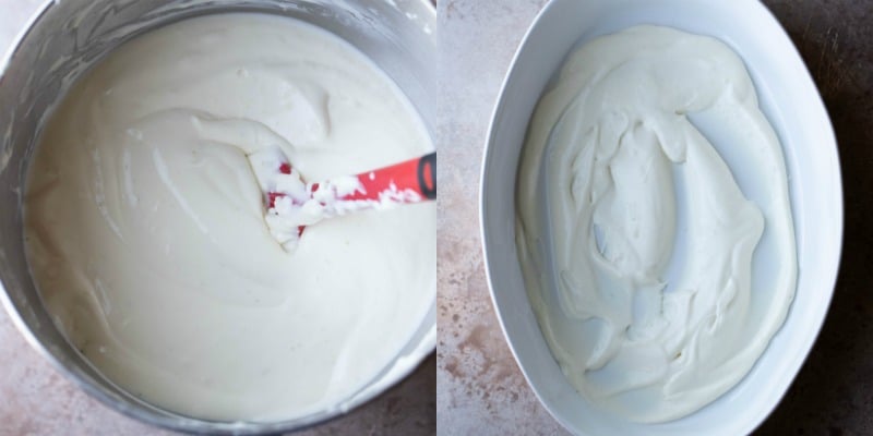 Whipped cream in a silver mixing bowl