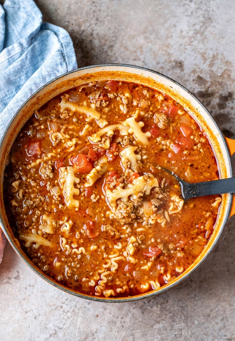 Orange Dutch oven full of lasagna soup