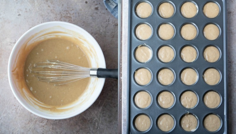 Apple cider donut muffin batter in a mixing bowl