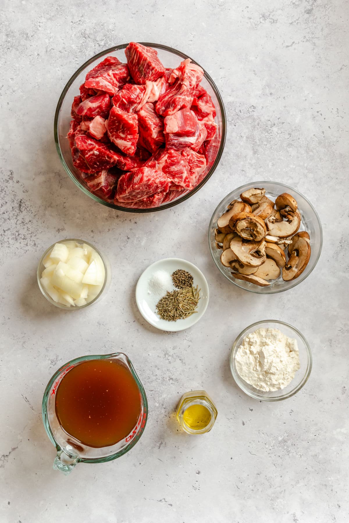 Ingredients for crock pot beef tips in dishes.