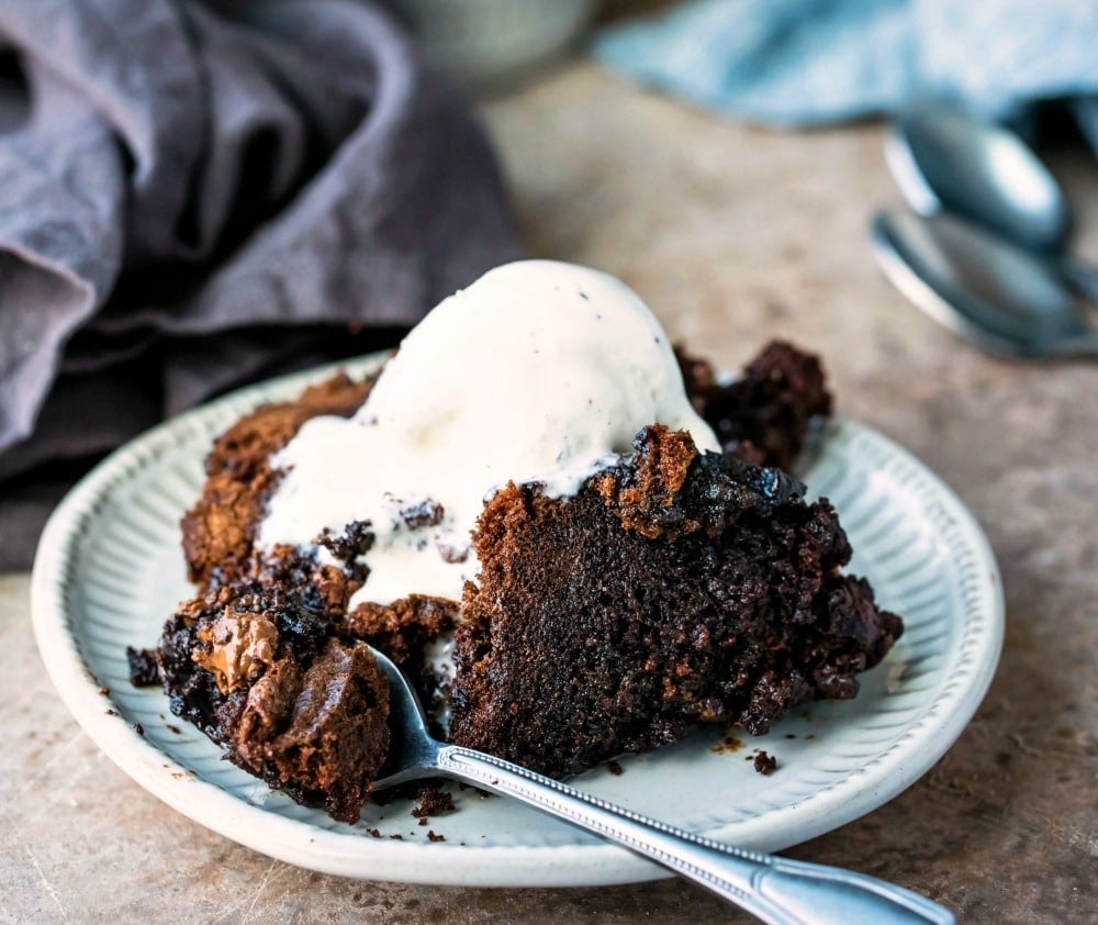 Slow Cooker Brownie on a plate with a spoon