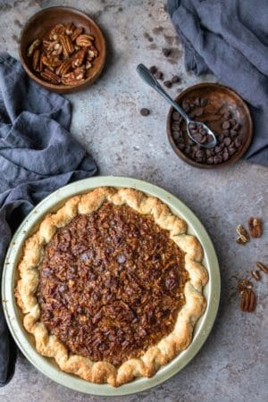 Chocolate Pecan Pie in a gold pie pan