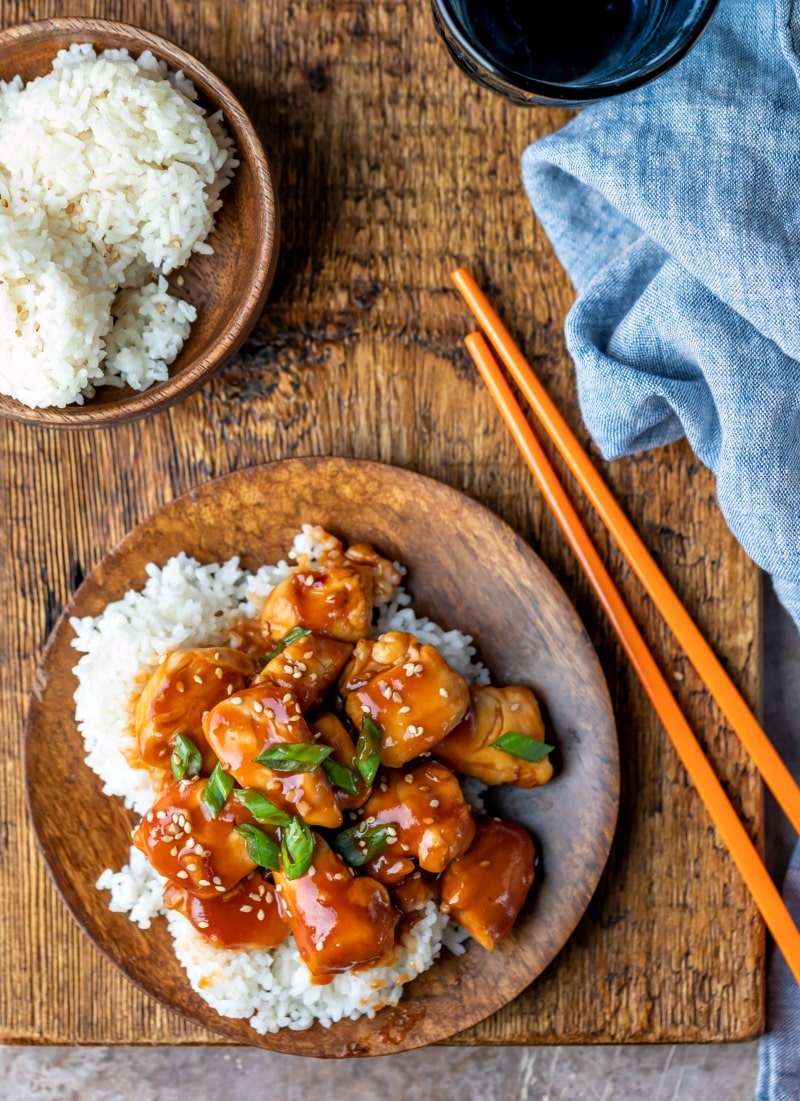 Easy Orange Chicken Recipe Overhead photo of orange chicken on a bed of white rice