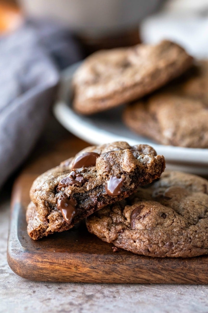 Half of a chocolate mint cookie on a full cookie