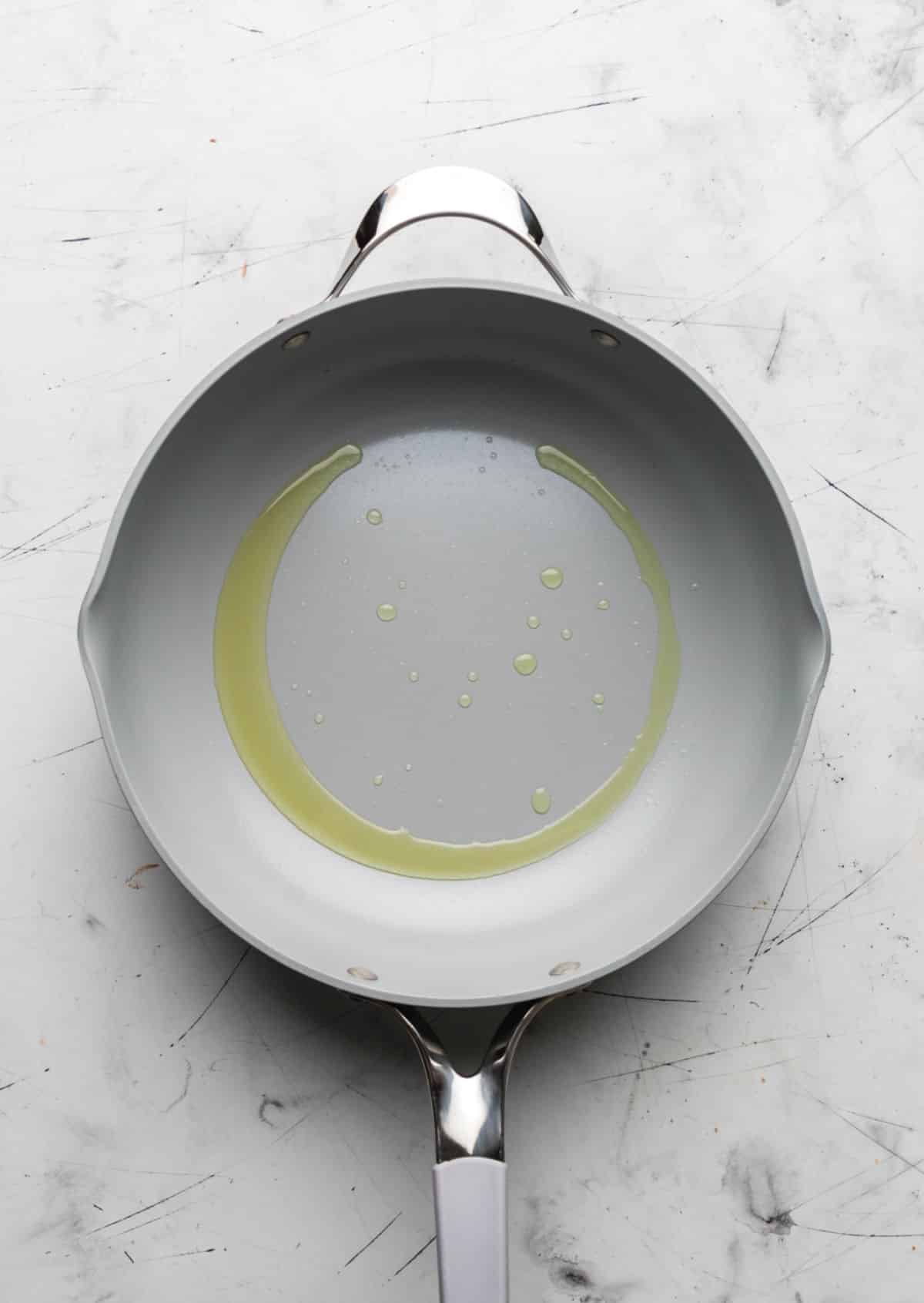 Oil in a hot skillet.