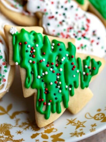 Close up sugar cookie shaped like a Christmas tree