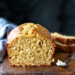 Butter knife with butter next to Banana Oatmeal Bread