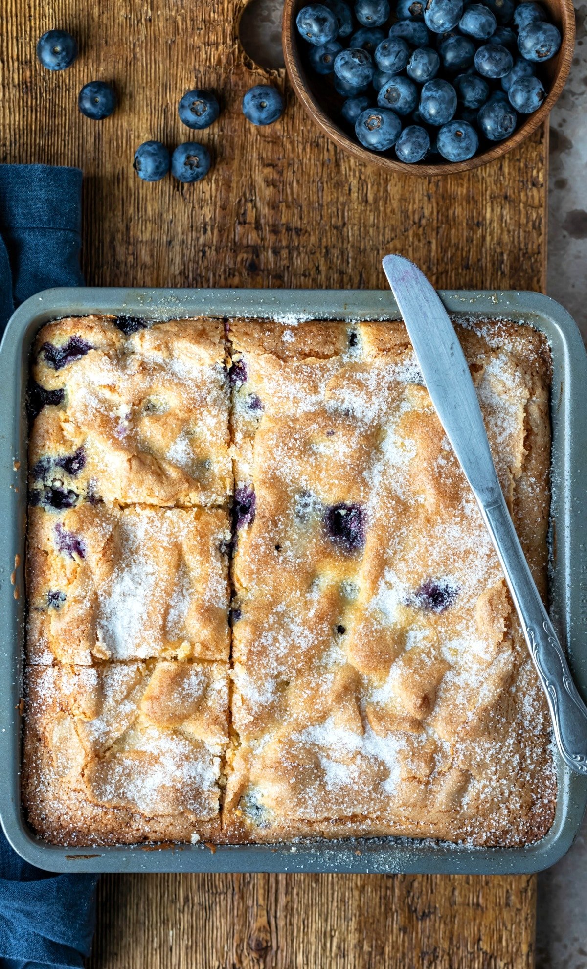 blueberry cake in an 8x8 pan