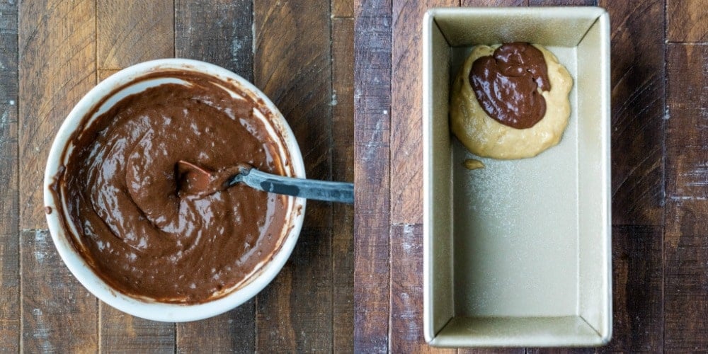 Chocolate banana bread batter in a white mixing bowl