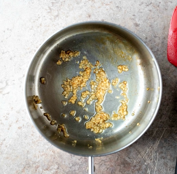 Sauteed garlic in a saucepan