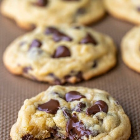 Chocolate chip pudding cookie with a bite out of it