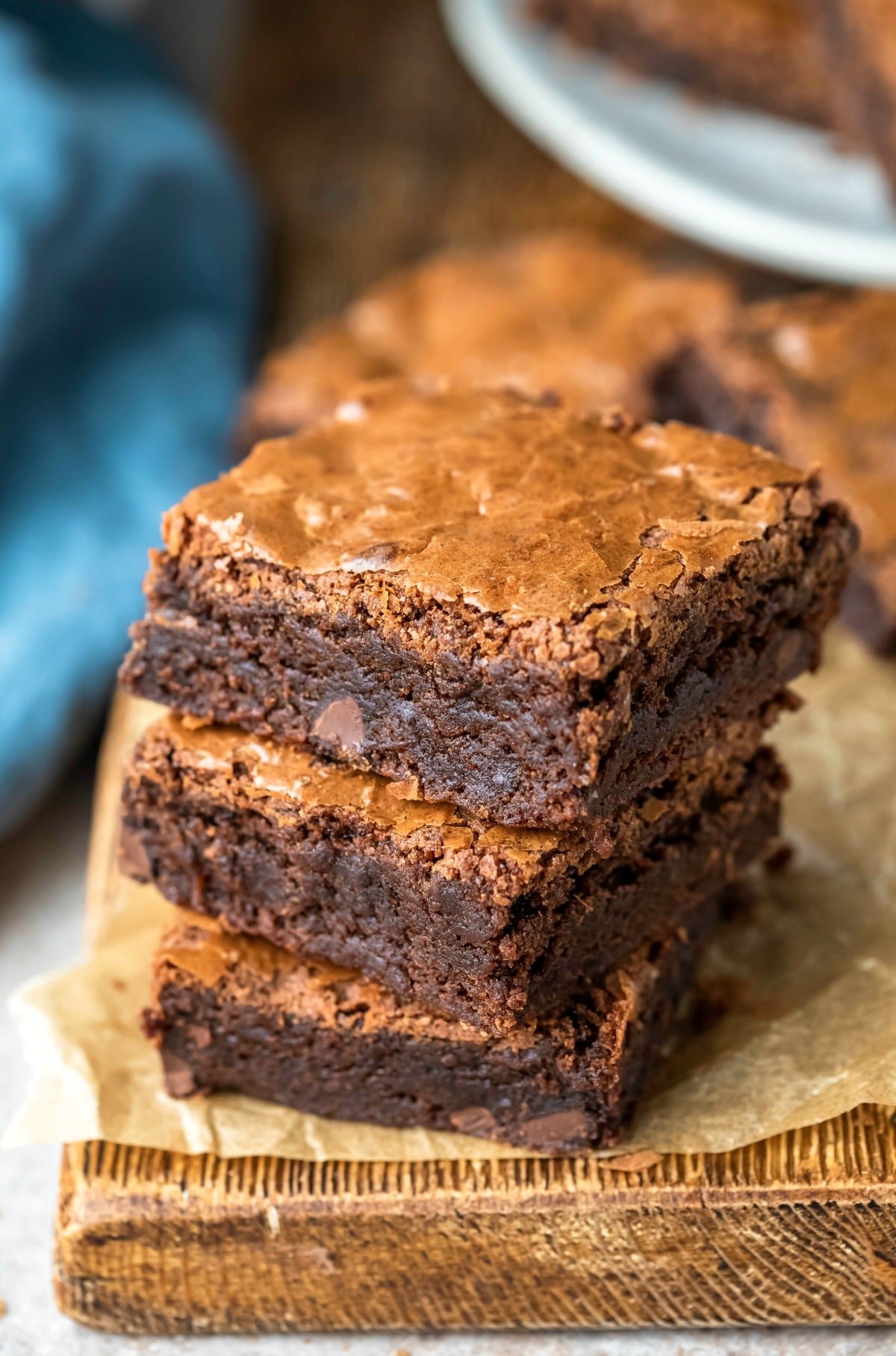 Three Mexican brownies on a piece of brown parchment paper