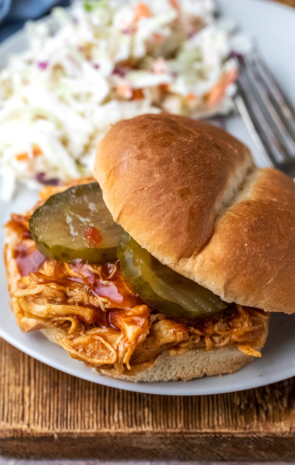 Crock pot brown sugar bbq bourbon chicken on a whole wheat bun