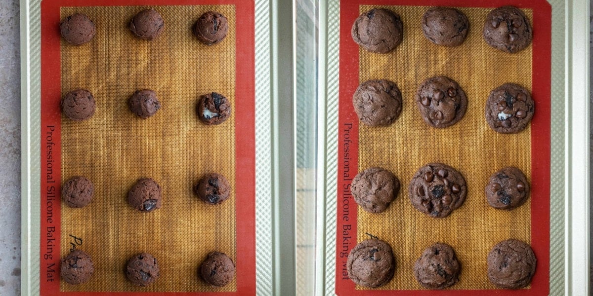 Scoops of chocolate oreo cookie dough on a cookie sheet