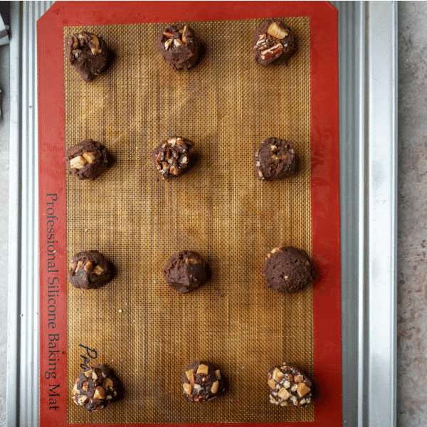 Turtle cookie dough on a baking sheet