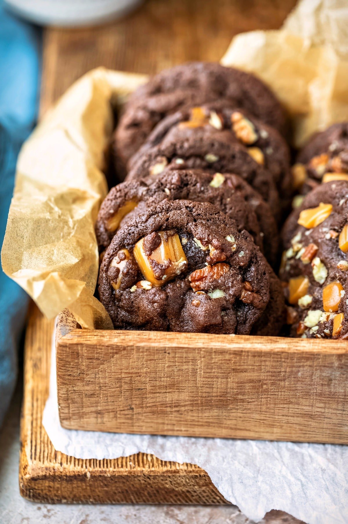 Row of turtle cookies in a wooden box