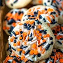 Vanilla cookies topped with Halloween colored sprinkles