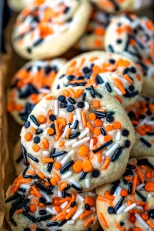 Vanilla cookies topped with Halloween colored sprinkles