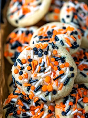 Vanilla cookies topped with Halloween colored sprinkles