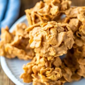 Plate of butterscotch cornflake cookies on a wooden cutting board