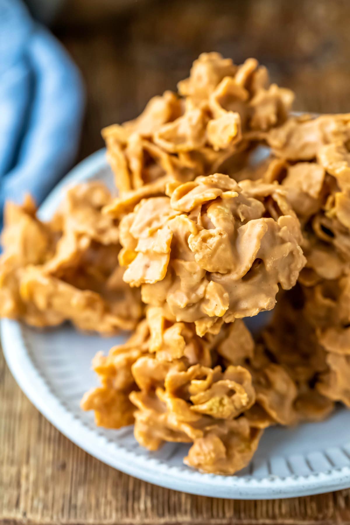 Plate of butterscotch cornflake cookies on a wooden cutting board