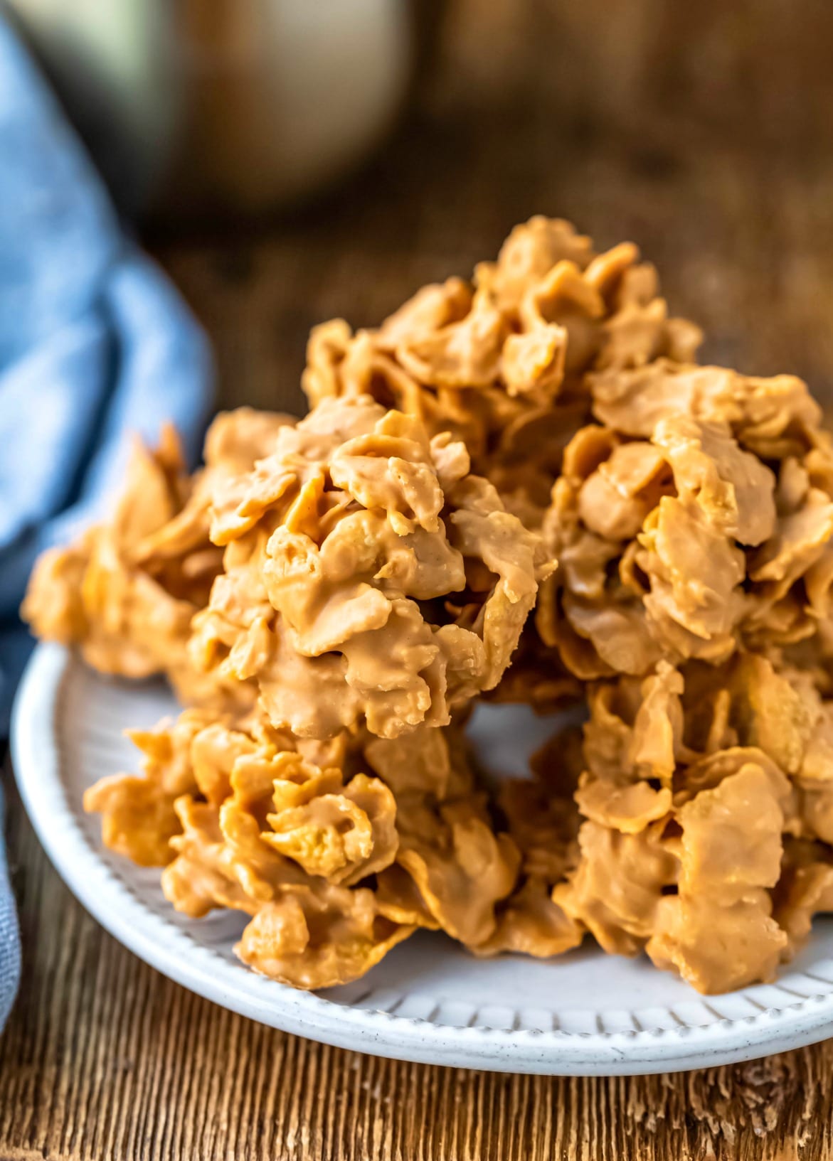 Stack of butterscotch cornflake cookies on a white plate