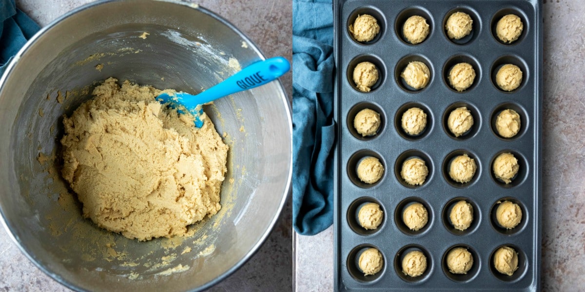 Peanut butter cup cookie dough in a mini muffin tin.